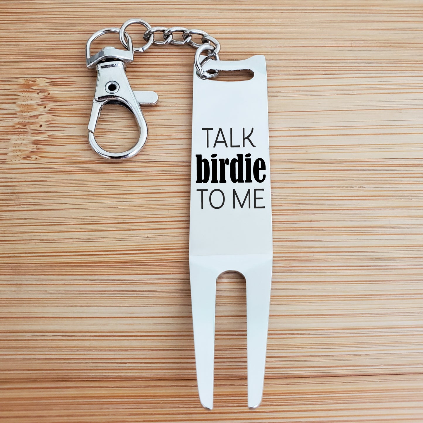 A LITTLE BIRDIE DIVOT FIXER