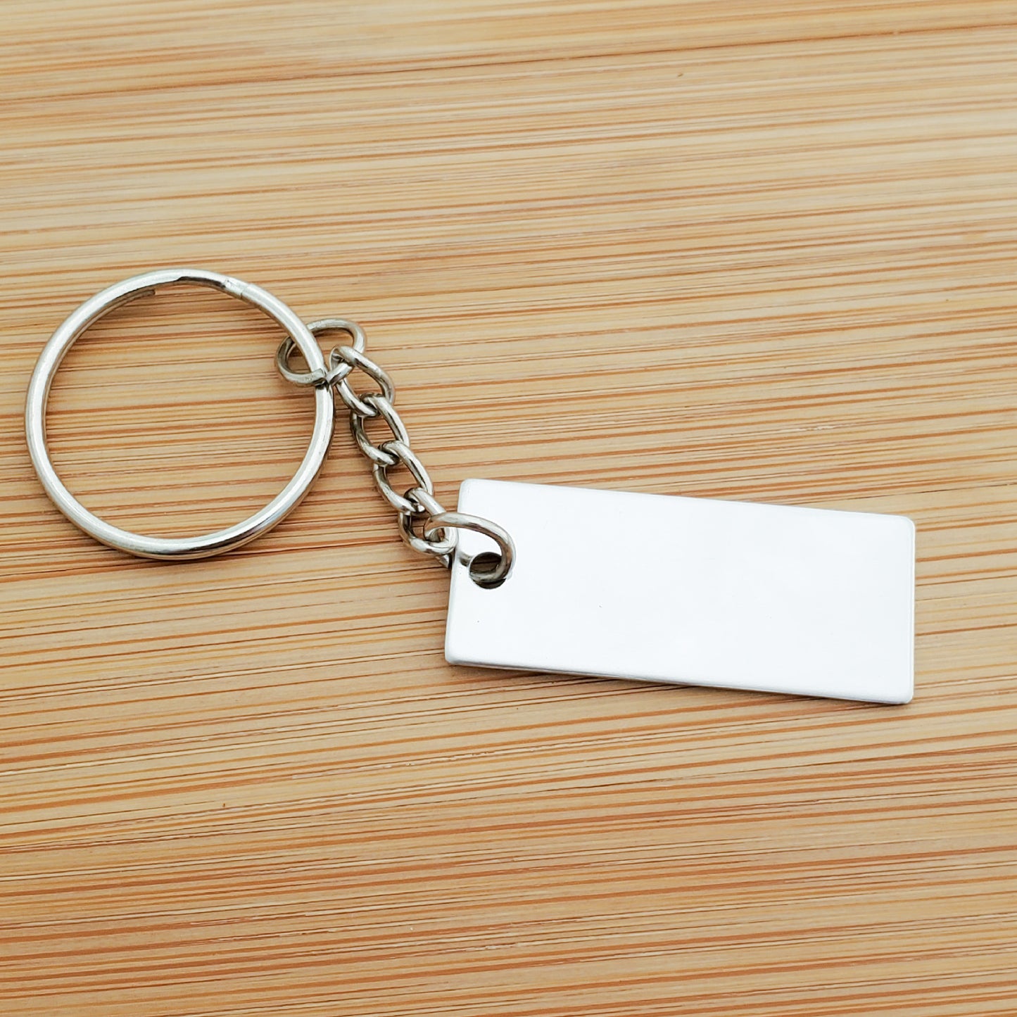 A CUSTOM ENGRAVED KEYCHAIN