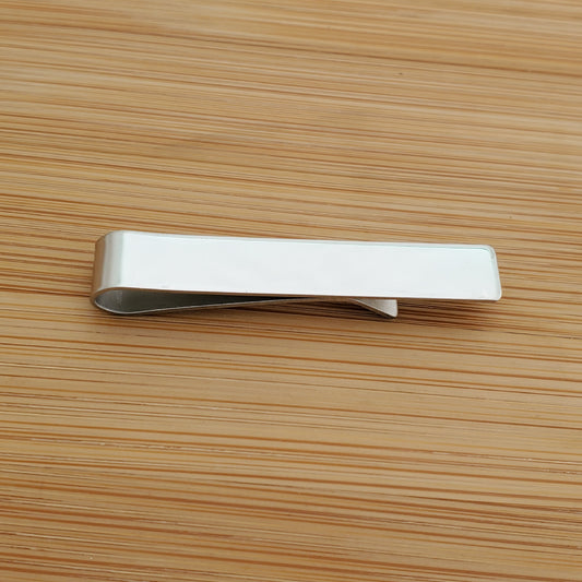 A CUSTOM ENGRAVED TIE CLIP