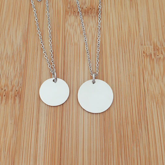 A CUSTOM ENGRAVED COIN NECKLACE