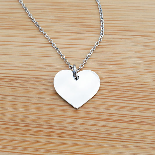 A CUSTOM ENGRAVED HEART NECKLACE