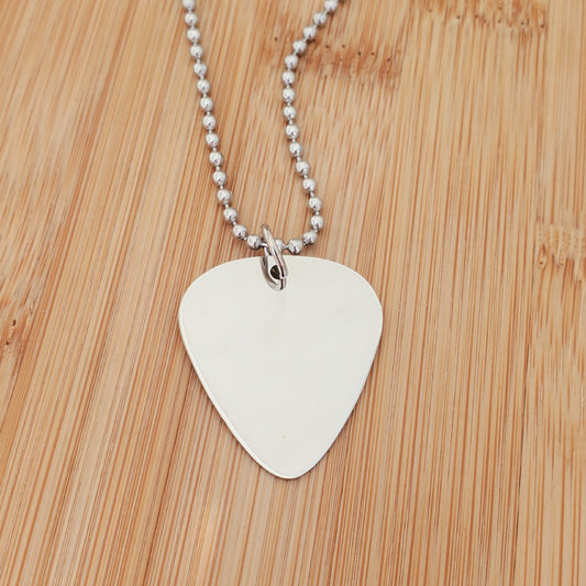 A CUSTOM ENGRAVED PICK NECKLACE